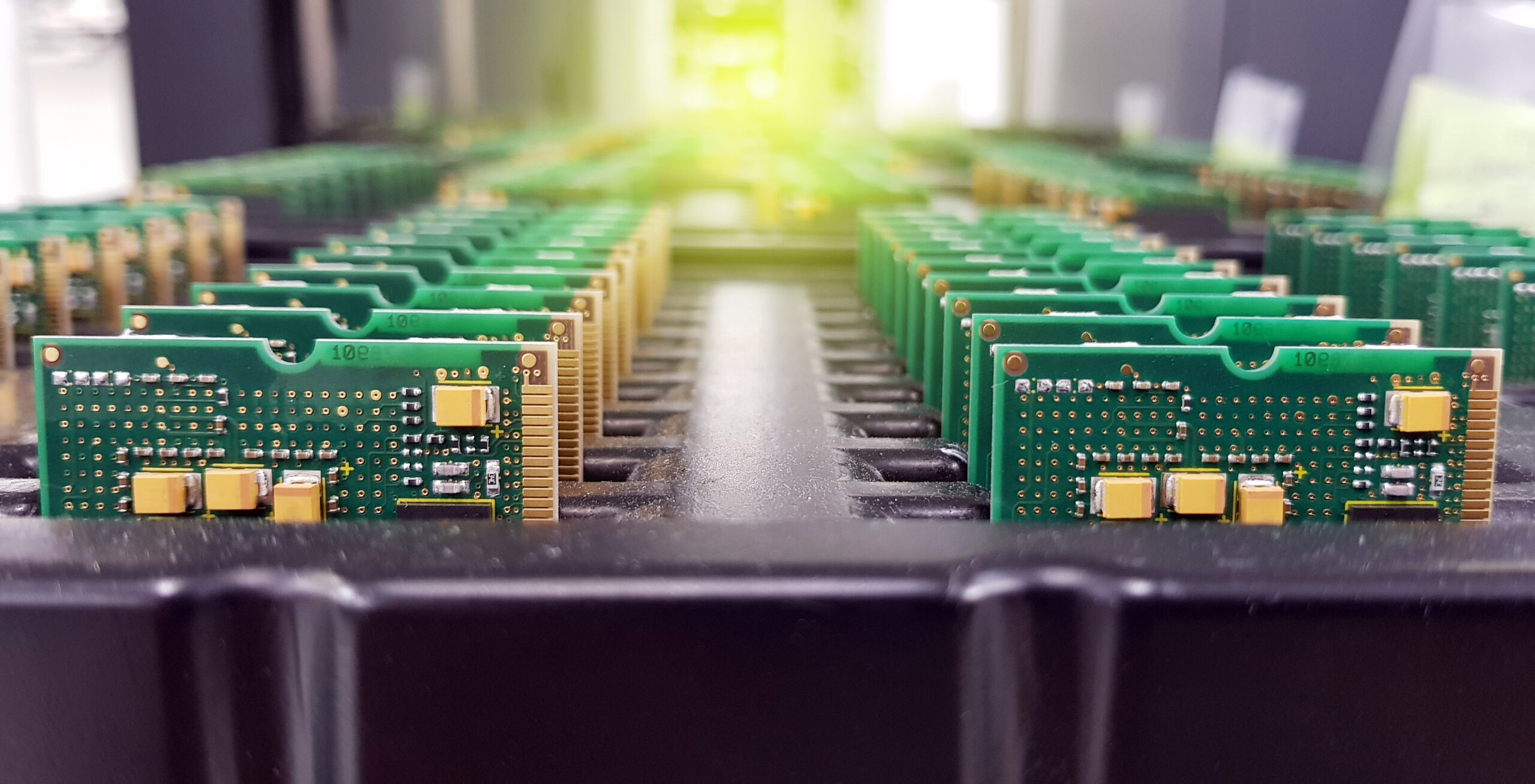 Electronics Manufacturing Services, Assembly Of Circuit Board arrangement, close-up of the raw of PCBA in tray.